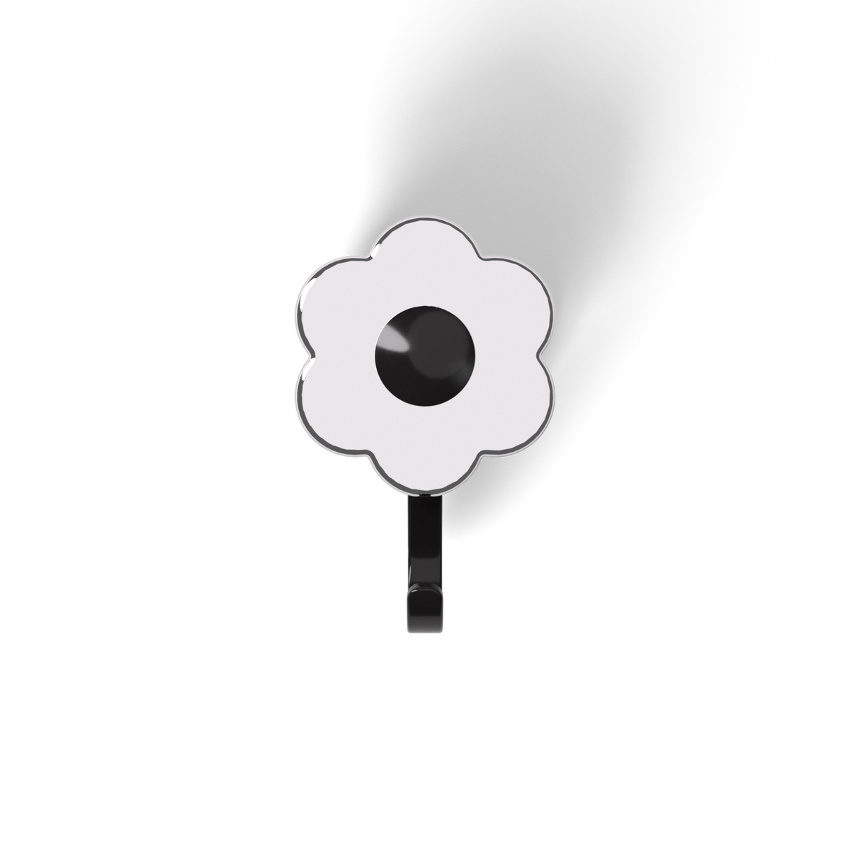 Der „Blumenhaken“ der Kochblume GmbH verfügt über eine weiße, blumenförmige Oberseite mit schwarzem Zentrum, die einen dezenten Schatten auf weißem Hintergrund wirft. Dieser Haken verbindet nahtlos funktionale Eleganz mit minimalistischem Design und ist damit eine ideale Dekorationslösung für moderne Räume.
